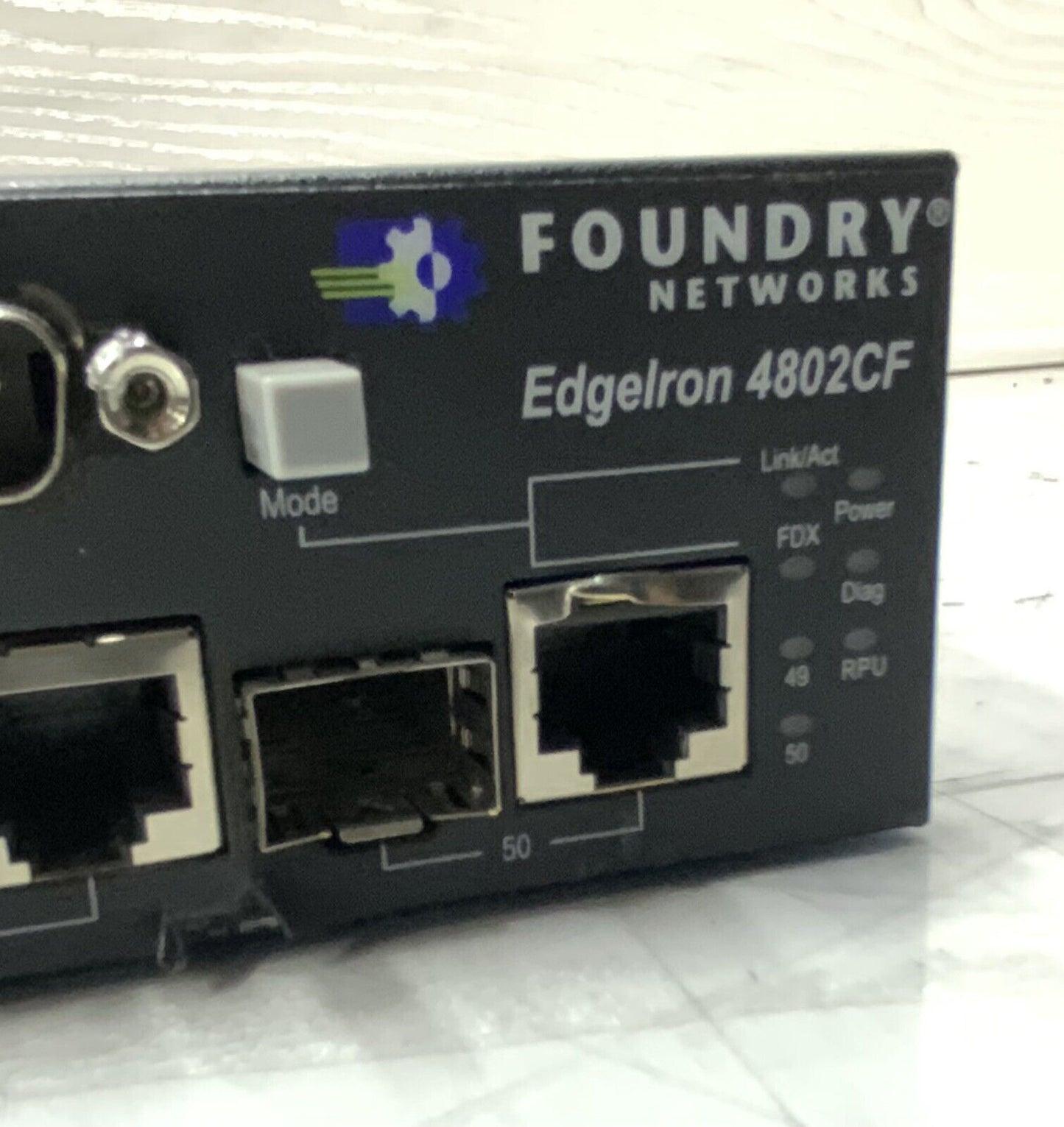 Foundry Networks EdgeIron 4802CF 48-Port 100MB 2xGBIC Managed Switch